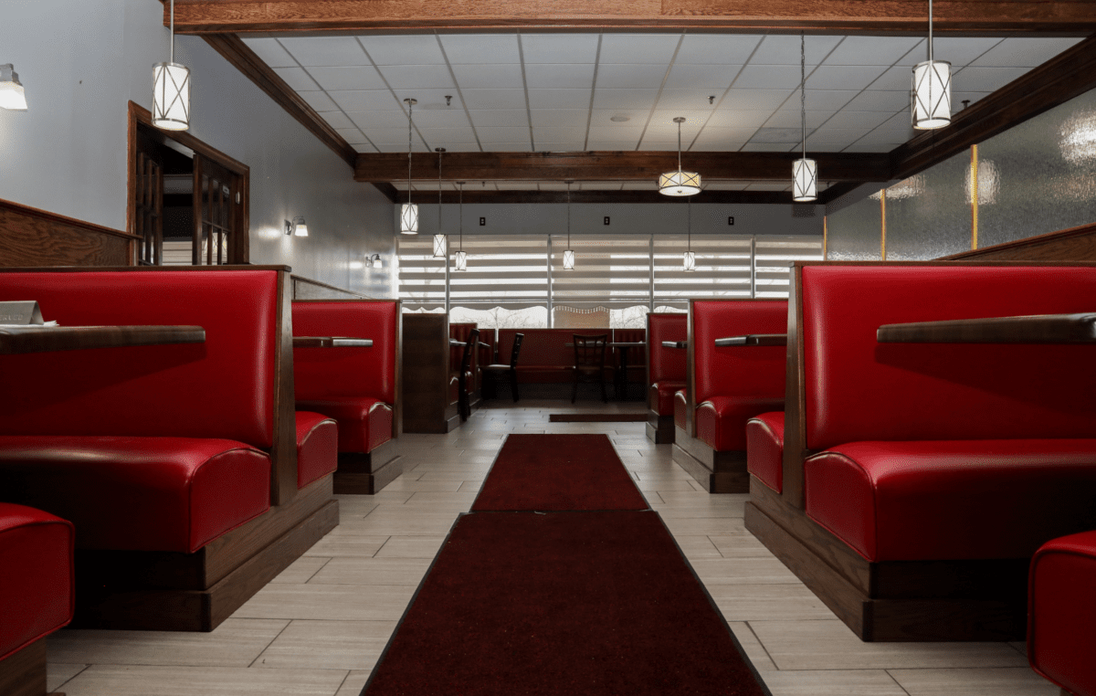 Red Leather Booths In A Restaurant.