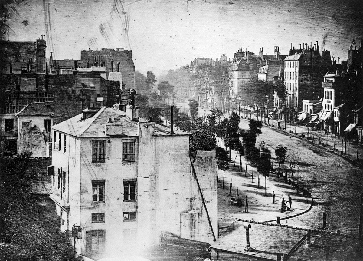 A Vintage Black And White Photograph Capturing The Nostalgic Essence Of A Parisian Street.