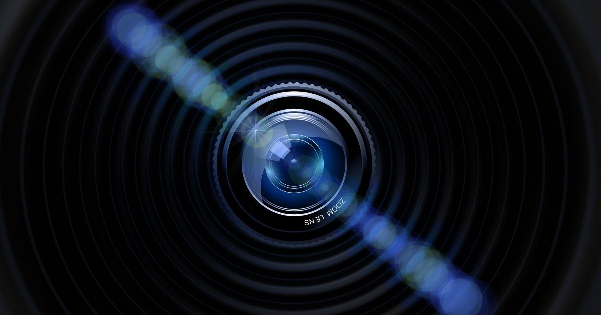 A Camera Lens On A Black Background For A Photo Shoot.