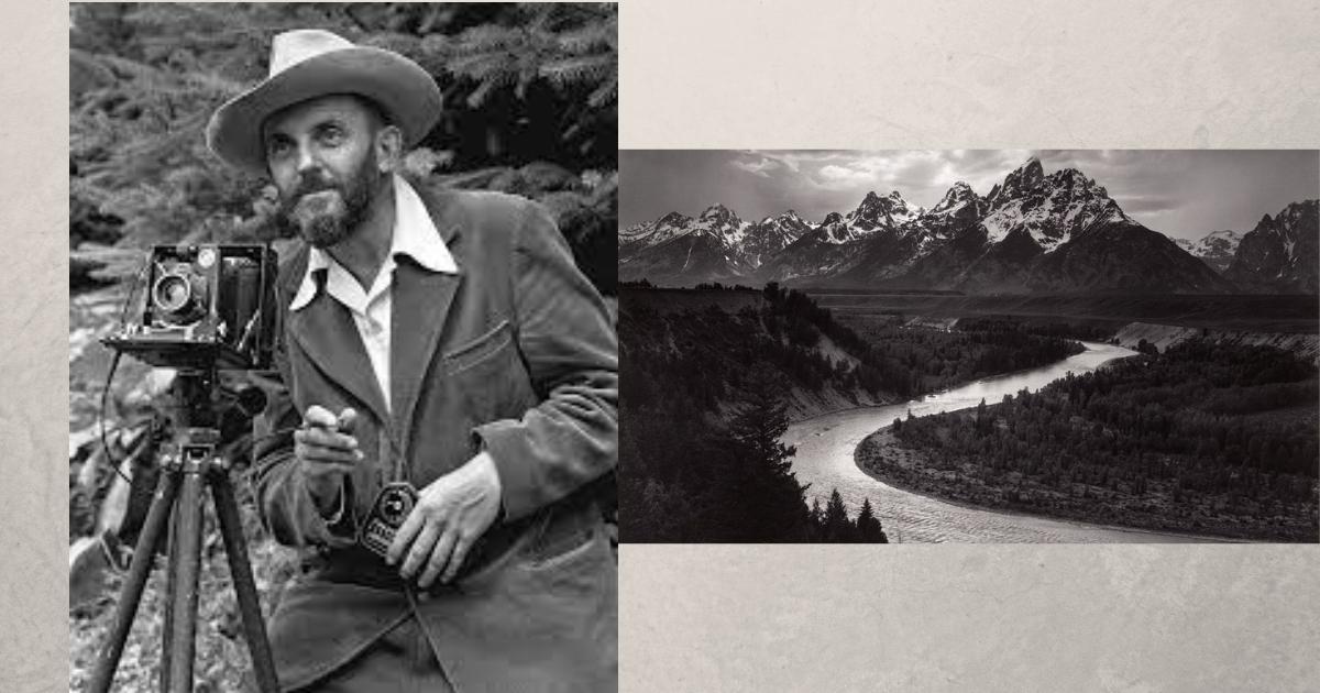 A Monochrome Photograph Capturing A Photographer Near A River.