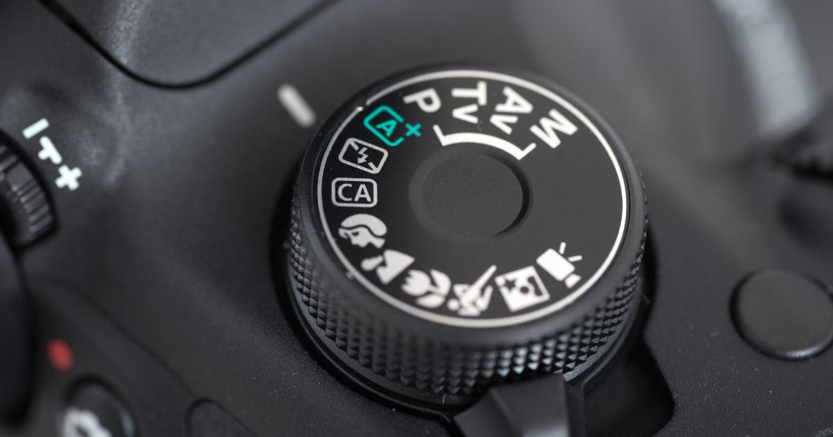 A Close Up Of A Button On A Dslr Camera For Photography Beginners.