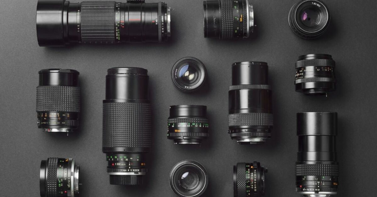 A Group Of Camera Lenses Arranged On A Black Surface, Showcasing The Necessary Steps To Photography.