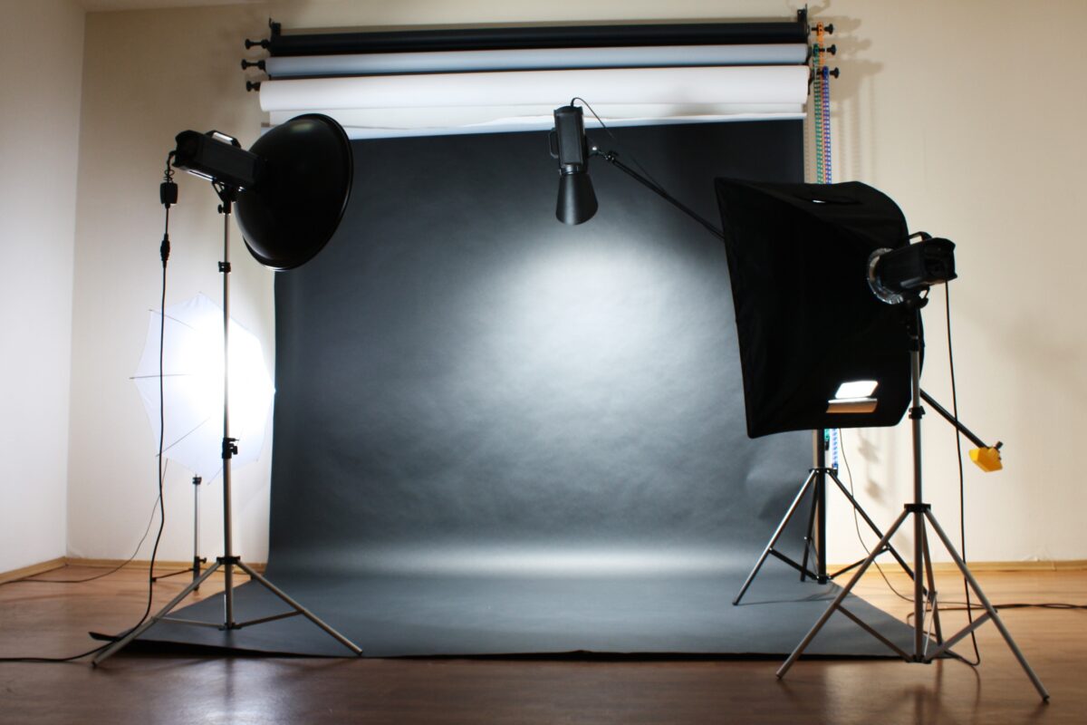 A Photo Studio With A Black Photography Backdrop.