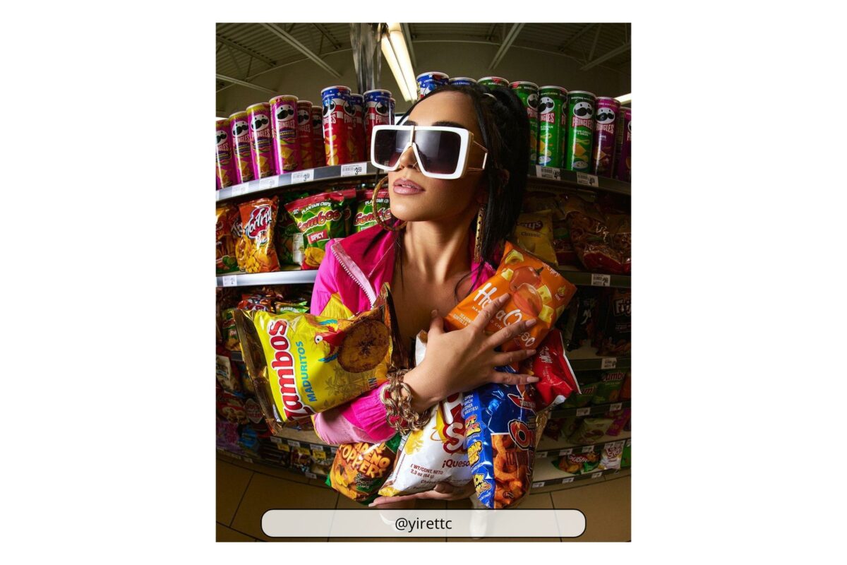 A Woman Wearing Sunglasses While Shopping In A Grocery Store.