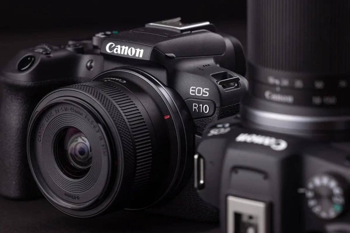 A Budget-Friendly Canon Eos R10 Camera With A Lens Next To It.
