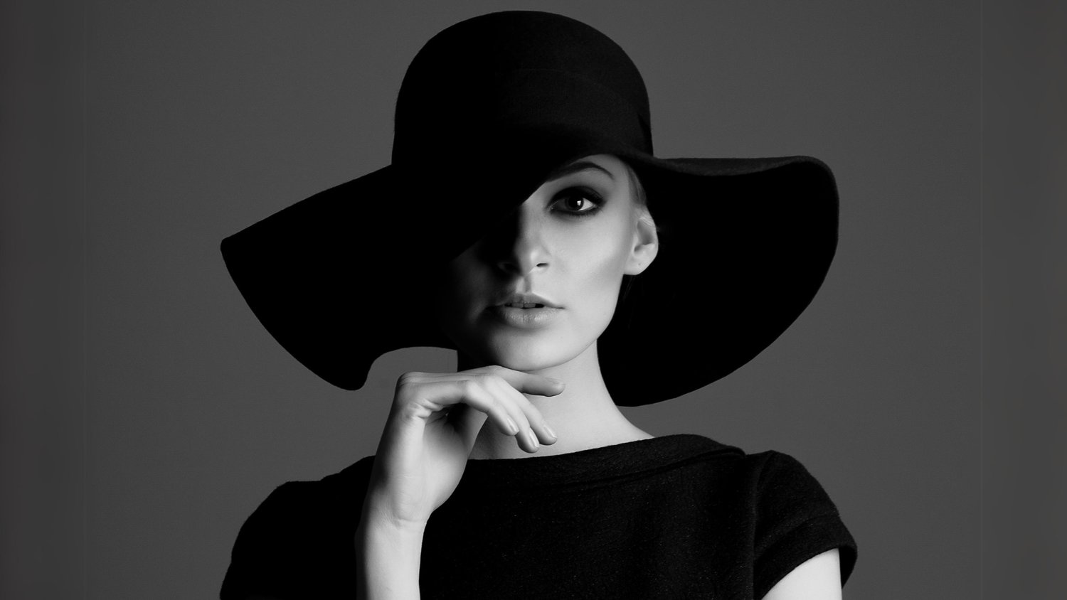 Hartford A Black And White Portrait Photo Of A Woman In A Hat, Showcasing Photography Tips For Capturing Striking Portraits.
