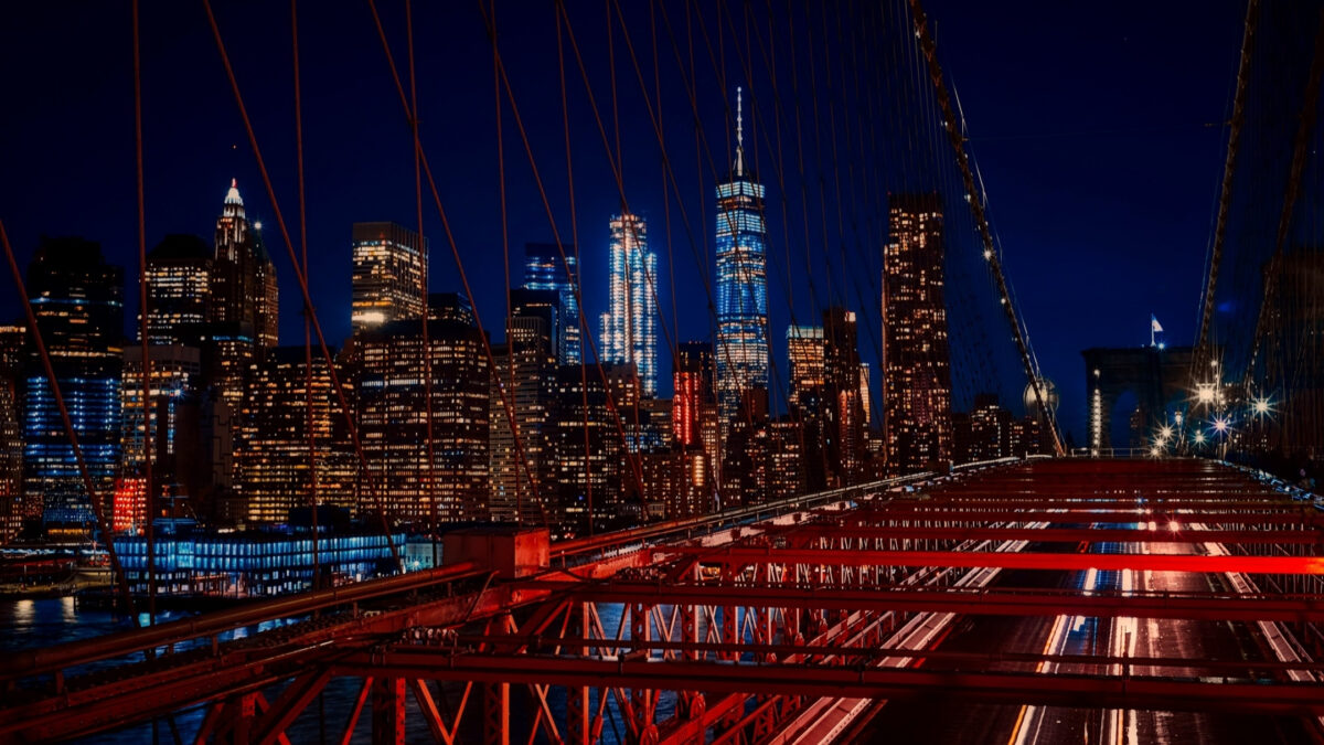 The Urban Photography Captures The Beautifully Lit Brooklyn Bridge At Night.
